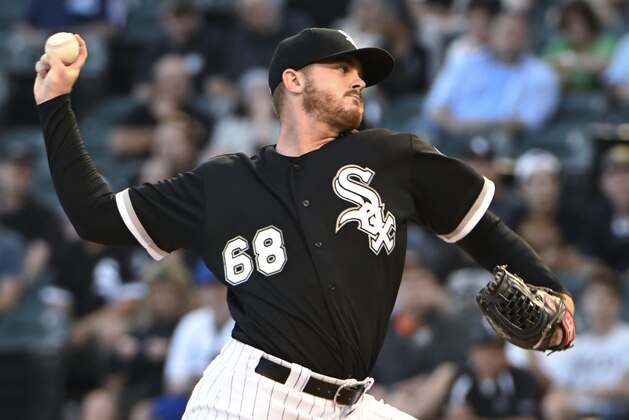 Chicago White Sox starting pitcher Dylan Covey throws to a Kansas City Royals batter during the first inning of a baseball game Wednesday, Aug. 1, 2018, in Chicago. (AP Photo/David Banks)