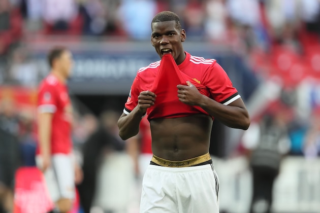 LONDON, ENGLAND - MAY 19: Paul Pogba of Manchester United looks dejected and pulls up his shirt during the FA Cup Final between Chelsea and Manchester United at Wembley Stadium on May 19, 2018 in London, England. (Photo by Matthew Ashton - AMA/Getty Images)