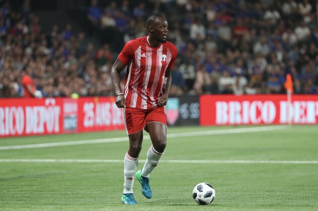 NANTERRE, FRANCE - JUNE 12:  Usain Bolt of FIFA 98 reacts during the Friendly match between France 98 and FIFA 98 at U Arena on June 12, 2018 in Nanterre near Paris, France.  (Photo by Xavier Laine/Getty Images)