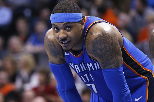 FILE - In this Feb. 13, 2018, file photo,  Oklahoma City Thunder forward Carmelo Anthony pauses during the team''s NBA basketball game against the Cleveland Cavaliers in Oklahoma City. Anthony plans to opt in and take the $28 million he is due next season. The New York Times first reported the 34-year-old Anthony's decision to bypass the chance to become a free agent. A person with knowledge of details confirmed Anthony's choice to The Associated Press on Friday night, June 22. The person spoke on the condition of anonymity because he was not authorized to discuss the situation publicly. (AP Photo/Sue Ogrocki, File)