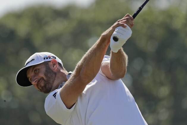 Dustin Johnson plays his shot from the ninth tee during the final round of the U.S. Open Golf Championship, Sunday, June 17, 2018, in Southampton, N.Y. (AP Photo/Julio Cortez)