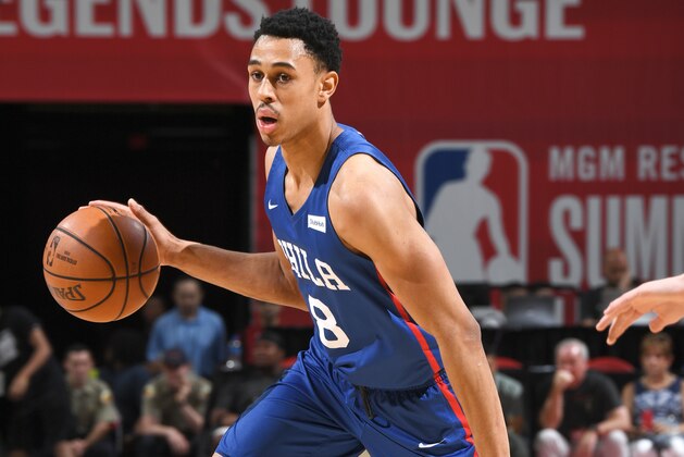LAS VEGAS, NV - JULY 14: Zhaire Smith #8 of the Philadelphia 76ers handles the ball against the Milwaukee Bucks during the 2018 Las Vegas Summer League on July 14, 2018 at the Thomas & Mack Center in Las Vegas, Nevada. NOTE TO USER: User expressly acknowledges and agrees that, by downloading and/or using this photograph, user is consenting to the terms and conditions of the Getty Images License Agreement. Mandatory Copyright Notice: Copyright 2018 NBAE (Photo by Garrett Ellwood/NBAE via Getty Images)