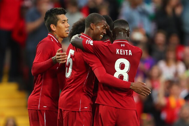 LIVERPOOL, ENGLAND - AUGUST 07: Georginio Wijnaldum of Liverpool celebrates after scoring a goal to make it 2-0 during the pre-season friendly between Liverpool and Torino at Anfield on August 7, 2018 in Liverpool, England. (Photo by Robbie Jay Barratt - AMA/Getty Images)