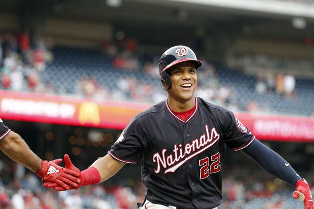 Washington Nationals' Juan Soto celebrates after his solo home run during the first inning of the second baseball game of a doubleheader against the Atlanta Braves at Nationals Park, Tuesday, Aug. 7, 2018, in Washington.(AP Photo/Alex Brandon)
