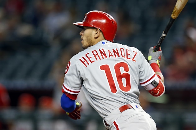 Philadelphia Phillies' Cesar Hernandez watches his single during the first inning of the team's baseball game against the Arizona Diamondbacks, Tuesday, Aug. 7, 2018, in Phoenix. (AP Photo/Rick Scuteri)