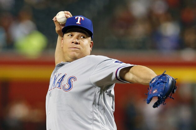 Texas Rangers starting pitcher Bartolo Colon (40) in the first inning during a baseball game against the Arizona Diamondbacks, Tuesday, July 31, 2018, in Phoenix. (AP Photo/Rick Scuteri)