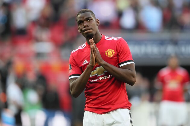 LONDON, ENGLAND - MAY 19: Paul Pogba of Manchester United looks to pray during the FA Cup Final between Chelsea and Manchester United at Wembley Stadium on May 19, 2018 in London, England. (Photo by Matthew Ashton - AMA/Getty Images)