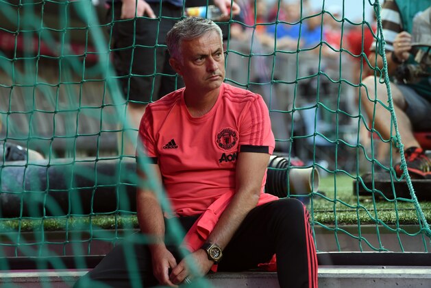 Manchester United's Portuguese manager Jose Mourinho waits for the warm up prior to the pre-season friendly football match between FC Bayern Munich and Manchester United at the Allianz Arena in Munich, southern Germany, on August 5, 2018. (Photo by Christof STACHE / AFP)        (Photo credit should read CHRISTOF STACHE/AFP/Getty Images)