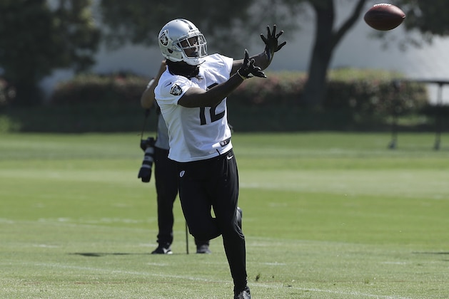 Oakland Raiders wide receiver Martavis Bryant catches a pass during practice at the team's NFL football training facility in Alameda, Calif., Tuesday, May 29, 2018. (AP Photo/Jeff Chiu)
