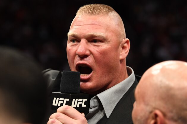 LAS VEGAS, NV - JULY 07:  Brock Lesnar confronts Daniel Cormier in their UFC heavyweight championship fight during the UFC 226 event inside T-Mobile Arena on July 7, 2018 in Las Vegas, Nevada.  (Photo by Josh Hedges/Zuffa LLC/Zuffa LLC via Getty Images)