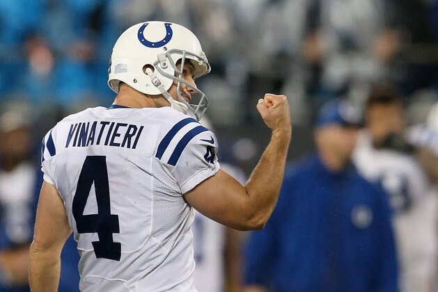 CHARLOTTE, NC - NOVEMBER 02:  Adam Vinatieri #4 of the Indianapolis Colts pumps his fist after making the first overtime field goal against the Carolina Panthers during their game at Bank of America Stadium on November 2, 2015 in Charlotte, North Carolina.  (Photo by Streeter Lecka/Getty Images)