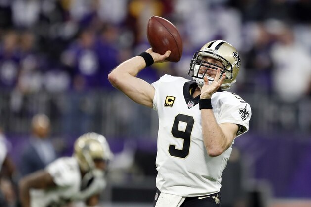 New Orleans Saints quarterback Drew Brees (9) throws before an NFL divisional football playoff game against the Minnesota Vikings in Minneapolis, Sunday, Jan. 14, 2018. (AP Photo/Charlie Neibergall)