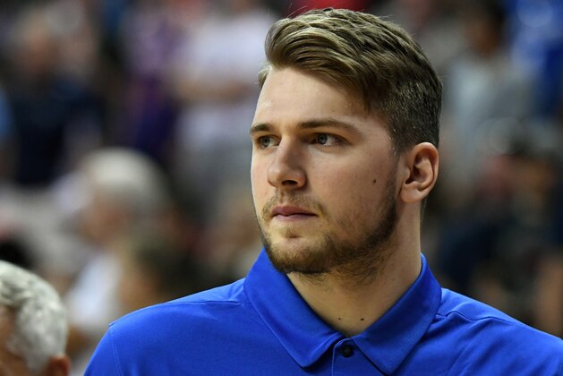 LAS VEGAS, NV - JULY 09:  Luka Doncic #77 of the Dallas Mavericks walks on the court after a 2018 NBA Summer League game against the Golden State Warriors at the Thomas & Mack Center on July 9, 2018 in Las Vegas, Nevada. NOTE TO USER: User expressly acknowledges and agrees that, by downloading and or using this photograph, User is consenting to the terms and conditions of the Getty Images License Agreement.  (Photo by Ethan Miller/Getty Images)