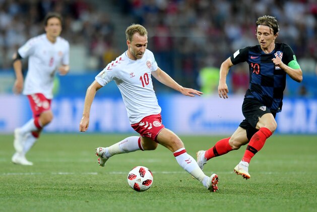 NIZHNY NOVGOROD, RUSSIA - JULY 01: Luka Modric of Croatia competes with Christian Eriksen of Denmark during the 2018 FIFA World Cup Russia Round of 16 match between Croatia and Denmark at Nizhny Novgorod Stadium on July 1, 2018 in Nizhny Novgorod, Russia. (Photo by Lukasz Laskowski/PressFocus/MB Media/Getty Images)