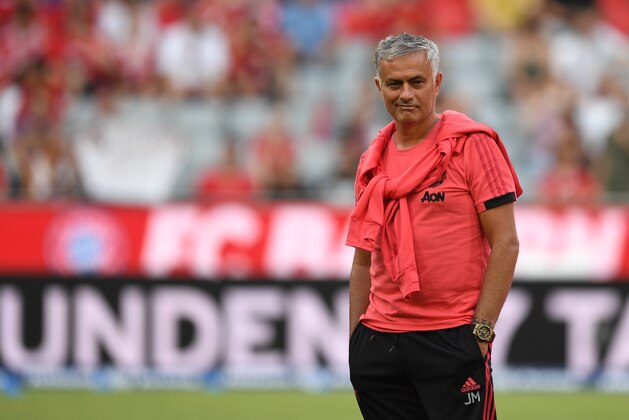 Manchester United's Portuguese manager Jose Mourinho attends the warm up prior to the pre-season friendly football match between FC Bayern Munich and Manchester United at the Allianz Arena in Munich, southern Germany, on August 5, 2018. (Photo by Christof STACHE / AFP) (Photo credit should read CHRISTOF STACHE/AFP/Getty Images) Manchester United's Portuguese manager Jose Mourinho attends the warm up prior to the pre-season friendly football match between FC Bayern Munich and Manchester United at the Allianz Arena in Munich, southern Germany, on August 5, 2018. (Photo by Christof STACHE / AFP) (Photo credit should read CHRISTOF STACHE/AFP/Getty Images)