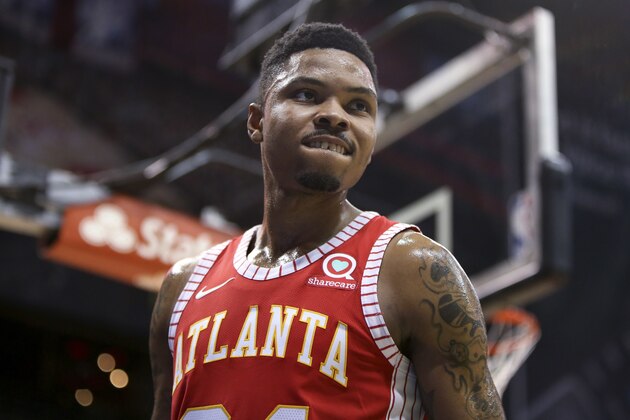 Atlanta Hawks guard Kent Bazemore reacts during the second half of the team's NBA basketball game against the Indiana Pacers, Wednesday, Feb. 28, 2018, in Atlanta. Atlanta won 107-102. (AP Photo/Brett Davis)