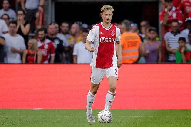 LIEGE, BELGIUM - AUGUST 7: Frenkie de Jong of Ajax during the UEFA Champions League  match between Standard Luik v Ajax at the Stade de Sclessin on August 7, 2018 in Liege Belgium (Photo by Erwin Spek/Soccrates/Getty Images)