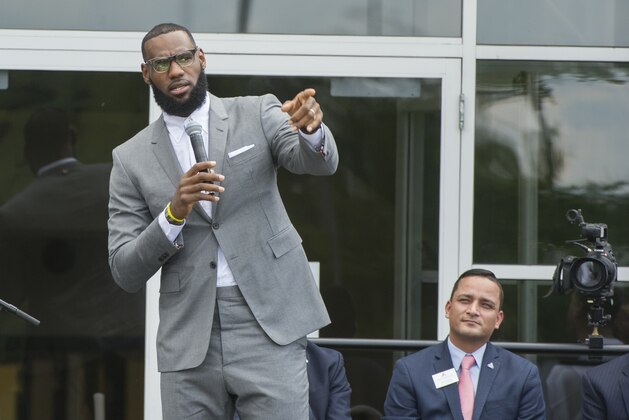 LeBron James speaks at the opening ceremony for the I Promise School in Akron, Ohio, Monday, July 30, 2018. The I Promise School is supported by the The LeBron James Family Foundation and is run by the Akron Public Schools. (AP Photo/Phil Long)