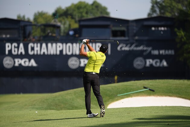 ST LOUIS, MO - AUGUST 09:  Rickie Fowler of the United States plays a shot on the 18th hole during the first round of the 2018 PGA Championship at Bellerive Country Club on August 9, 2018 in St Louis, Missouri.  (Photo by Ross Kinnaird/Getty Images)