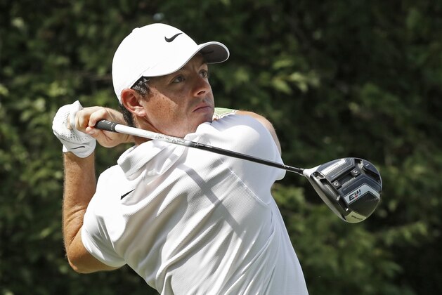 Rory McIlroy, of Northern Ireland, watches his tee shot on the 18th hole during the first round of the PGA Championship golf tournament at Bellerive Country Club, Thursday, Aug. 9, 2018, in St. Louis. (AP Photo/Brynn Anderson)