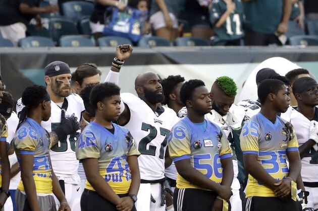 Philadelphia Eagles' Malcolm Jenkins, center left, raises his fist during the national anthem before the team's preseason NFL football game against the Pittsburgh Steelers, Thursday, Aug. 9, 2018, in Philadelphia. (AP Photo/Matt Rourke)