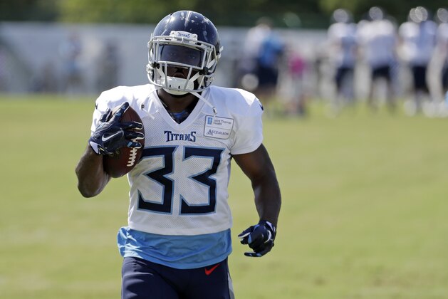 Tennessee Titans running back Dion Lewis runs the ball during NFL football training camp Sunday, July 29, 2018, in Nashville, Tenn. (AP Photo/Mark Humphrey)