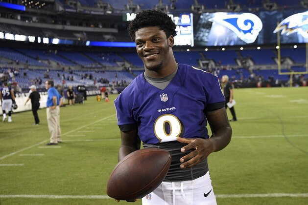 Baltimore Ravens quarterback Lamar Jackson stands on the field after a preseason NFL football game against the Los Angeles Rams, Thursday, Aug. 9, 2018, in Baltimore. (AP Photo/Nick Wass)