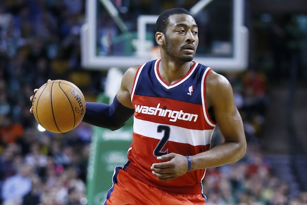 BOSTON, MA - APRIL 7: Washington Wizards point guard John Wall (2) looks to pass the ball during the Boston Celtics 107-96 victory over the Washington Wizards at TD Garden on April 7, 2013 in Boston, Massachusetts. NOTE TO USER: User expressly acknowledges and agrees that, by downloading and or using this photograph, User is consenting to the terms and conditions of the Getty Images License Agreement. (Photo by Chris Elise/Getty Images)
