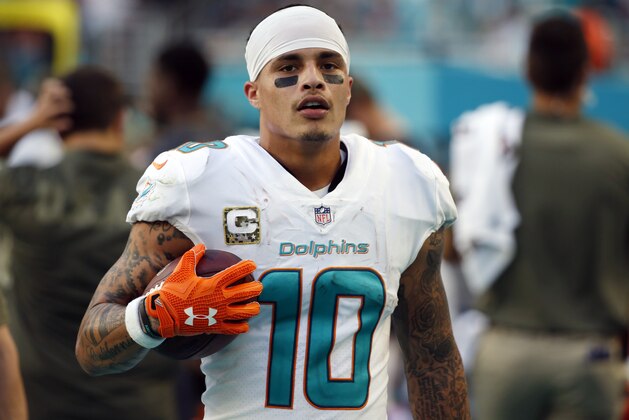 Miami Dolphins wide receiver Kenny Stills (10) walks on the sidelines, during the second half of an NFL football game against the Tampa Bay Buccaneers, Sunday, Nov. 19, 2017, in Miami Gardens, Fla. (AP Photo/Wilfredo Lee)