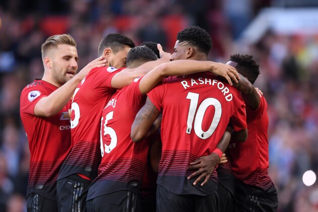 MANCHESTER, ENGLAND - AUGUST 10:  Paul Pogba of Manchester United (hidden) celebrates with team mates after scoring his team's first goal during the Premier League match between Manchester United and Leicester City at Old Trafford on August 10, 2018 in Manchester, United Kingdom.  (Photo by Laurence Griffiths/Getty Images)