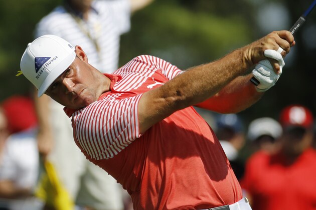 Gary Woodland hits from the fourth tee during the second round of the PGA Championship golf tournament at Bellerive Country Club, Friday, Aug. 10, 2018, in St. Louis. (AP Photo/Charlie Riedel)