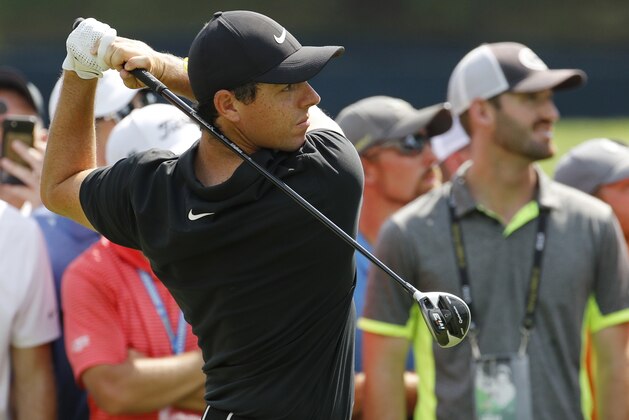 Rory McIlroy, of Northern Ireland, watches his shot on the seventh tee during the second round of the PGA Championship golf tournament at Bellerive Country Club, Friday, Aug. 10, 2018, in St. Louis. (AP Photo/Charlie Riedel)