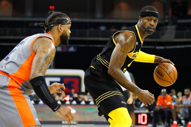 DULUTH, GA - AUGUST 10:  Stephen Jackson #5 of the Killer 3s drives to the basket against Andre Emmett of 3's Company during week eight of the BIG3 three on three basketball league at Infinite Energy Arena on August 10, 2018 in Duluth, Georgia.  (Photo by Kevin C. Cox/Getty Images)
