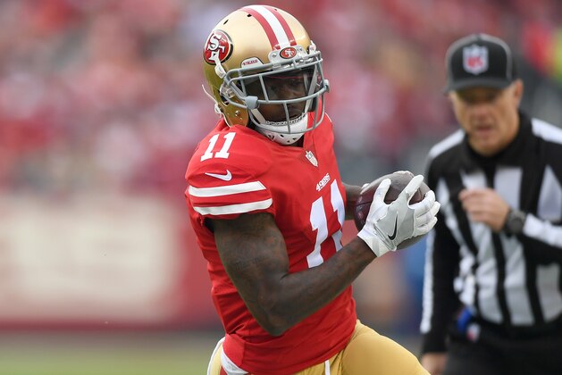 SANTA CLARA, CA - DECEMBER 24:  Marquise Goodwin #11 of the San Francisco 49ers runs up field with the ball after catching a pass against the Jacksonville Jaguars during an NFL football game at Levi's Stadium on December 24, 2017 in Santa Clara, California.  (Photo by Thearon W. Henderson/Getty Images)