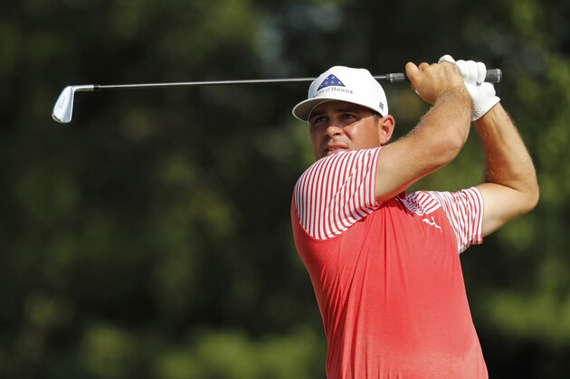 Gary Woodland tees off the 16th hole during the second round of the PGA Championship golf tournament at Bellerive Country Club, Friday, Aug. 10, 2018, in St. Louis. (AP Photo/Jeff Roberson)