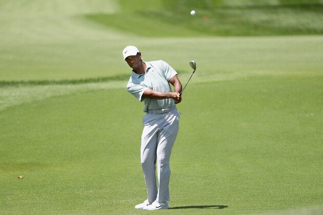 ST LOUIS, MO - AUGUST 11:  Tiger Woods of the United States plays a shot on the fourth hole during the third round of the 2018 PGA Championship at Bellerive Country Club on August 11, 2018 in St Louis, Missouri.  (Photo by Jamie Squire/Getty Images)