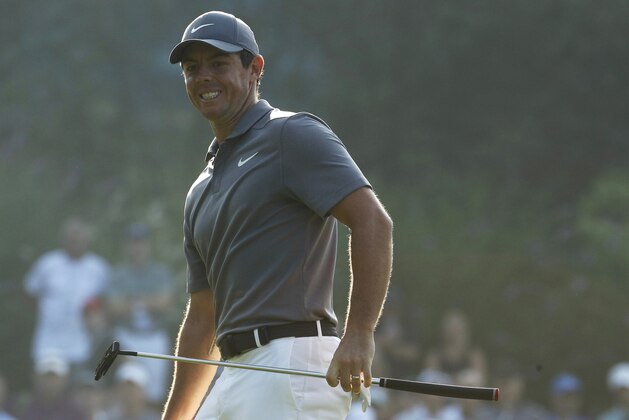 Rory McIlroy, of Northern Ireland, watches a putt on 12th green during the second round of the PGA Championship golf tournament at Bellerive Country Club, Saturday, Aug. 11, 2018, in St. Louis. (AP Photo/Charlie Riedel)