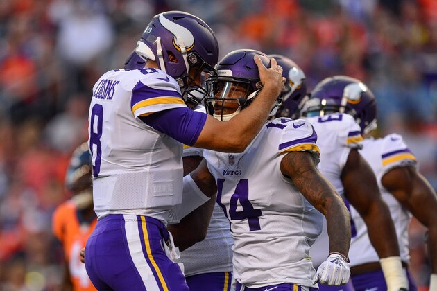 DENVER, CO - AUGUST 11:  Quarterback Kirk Cousins #8 of the Minnesota Vikings celebrates after a first quarter touchdown pass to wide receiver Stefon Diggs #14 against the Denver Broncos during an NFL preseason game at Broncos Stadium at Mile High on August 11, 2018 in Denver, Colorado. (Photo by Dustin Bradford/Getty Images)