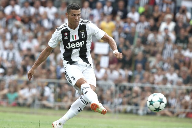 Juventus' forward from Portugal Cristiano Ronaldo scores a goal during the friendly football match between Juventus A and Juventus B at Villar Perosa, on August 12, 2018 at Villar Perosa. (Photo by Isabella Bonotto / AFP)        (Photo credit should read ISABELLA BONOTTO/AFP/Getty Images)