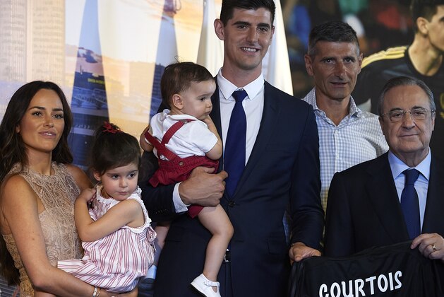 MADRID, SPAIN - AUGUST 09:  Thibaut Courtois and Marta Dominguez (L) pose with his family after being announced as new Real Madrid player at Estadio Santiago Bernabeu on August 9, 2018 in Madrid, Spain.  (Photo by Quality Sport Images/Getty Images)