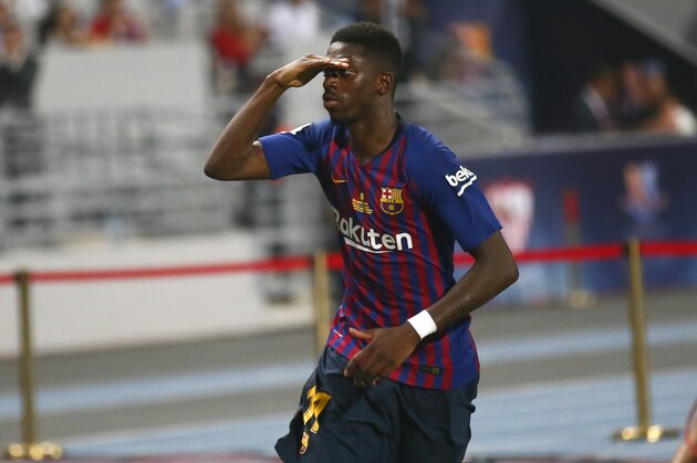 Barcelona's Ousmane Dembele celebrates after scoring his side's second goal during the Spanish Super Cup soccer match between Sevilla and Barcelona in Tangier, Morocco, Sunday, Aug. 12, 2018. (AP Photo/Mosa'ab Elshamy)