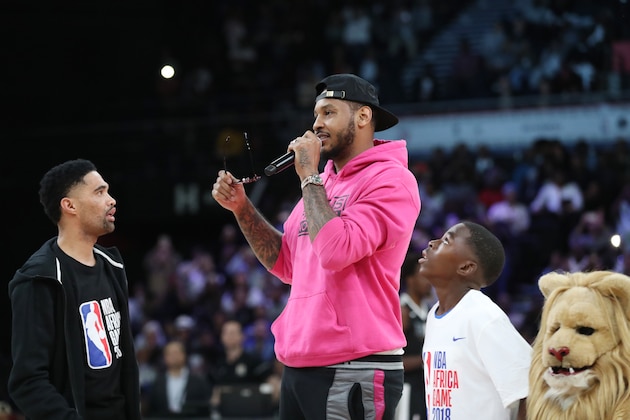 PRETORIA, SOUTH AFRICA - AUGUST 4: Carmelo Anthony addresses the crowd during the 2018 NBA Africa Game as part of the Basketball Without Borders Africa on August 4, 2018 at the Time Square Sun Arena in Pretoria, South Africa. NOTE TO USER: User expressly acknowledges and agrees that, by downloading and or using this photograph, User is consenting to the terms and conditions of the Getty Images License Agreement. Mandatory Copyright Notice: Copyright 2017 NBAE (Photo by Joe Murphy/NBAE via Getty Images)
