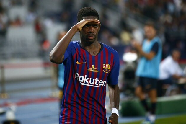 Barcelona's Ousmane Dembele celebrates after scoring his side's second goal during the Spanish Super Cup soccer match between Sevilla and Barcelona in Tangier, Morocco, Sunday, Aug. 12, 2018. (AP Photo/Mosa'ab Elshamy)
