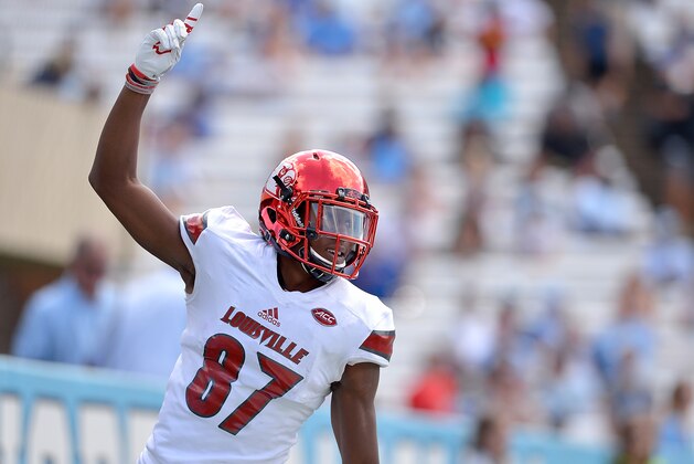 CHAPEL HILL, NC - SEPTEMBER 09:  Dez Fitzpatrick #87 of the Louisville Cardinals reacts after scoring a touchdown against the North Carolina Tar Heels during the game at Kenan Stadium on September 9, 2017 in Chapel Hill, North Carolina. Louisville won 47-35.  (Photo by Grant Halverson/Getty Images)