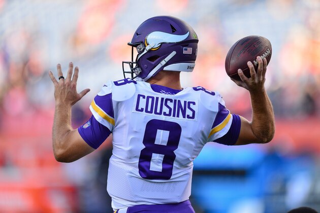 DENVER, CO - AUGUST 11:  Quarterback Kirk Cousins #8 of the Minnesota Vikings throws as he warms up before  an NFL preseason game against the Denver Broncos at Broncos Stadium at Mile High on August 11, 2018 in Denver, Colorado. (Photo by Dustin Bradford/Getty Images)