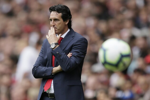 Arsenal manager Unai Emery watches from the sidelines during the English Premier League soccer match between Arsenal and Manchester City at the Emirates stadium in London, England, Sunday, Aug. 12, 2018. (AP Photo/Tim Ireland)