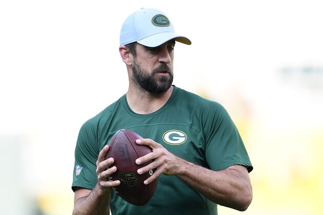 GREEN BAY, WI - AUGUST 09:  Aaron Rodgers #12 of the Green Bay Packers participates in warmups prior to a preseason game against the Tennessee Titans at Lambeau Field on August 9, 2018 in Green Bay, Wisconsin.  The Packers defeated the Titans 31-17.  (Photo by Stacy Revere/Getty Images)