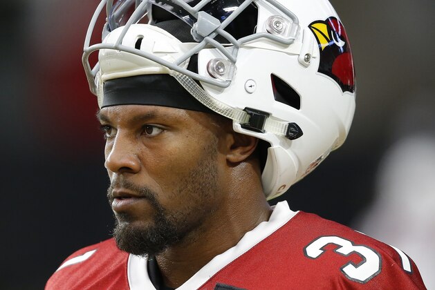 Arizona Cardinals running back David Johnson takes a break after running plays with the offense during an NFL football practice Monday, Aug. 13, 2018, in Glendale, Ariz. (AP Photo/Ross D. Franklin)