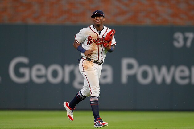 ATLANTA, GA - AUGUST 13:  Ronald Acuna Jr. #13 of the Atlanta Braves reacts after their 6-1 win over the Miami Marlins during game two of a doubleheader at SunTrust Park on August 13, 2018 in Atlanta, Georgia.  (Photo by Kevin C. Cox/Getty Images)