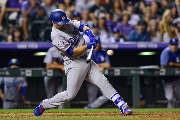 DENVER, CO - AUGUST 9:  Brian Dozier #6 of the Los Angeles Dodgers hits a two-run home run in the ninth inning against the Colorado Rockies at Coors Field on August 9, 2018 in Denver, Colorado.  (Photo by Dustin Bradford/Getty Images)